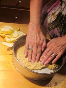 Spread the cake batter with your fingers. 