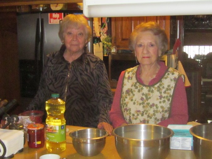 Elda Islas and Armida Islas as sisters-in-law who make Sonoran flat enchiladas according to directions handed down by Elda's mother and their mother-in-law Josefa.
