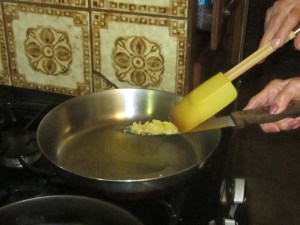 Brown the garlic in a little oil.