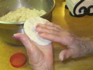 Making the masa patties.