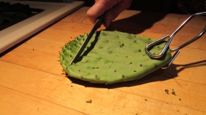 Scape off the stickers with a serrated steak knife.