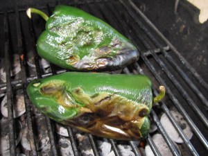 These chiles are charred on one side. I have turned them to blacken another side.