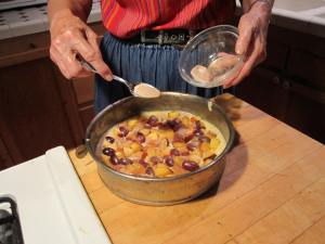 Sprinkle sugar mixture evenly over cake. 