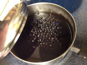 Simmering fan palm fruits