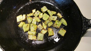 The cooked nopalitos turn from bright green to olive. 