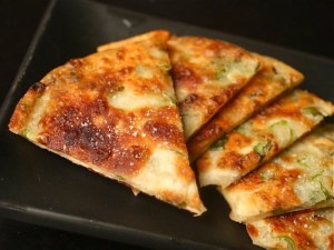 Savory pancakes using onion tops.
