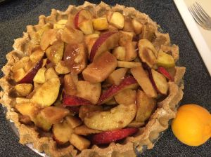 Membrillo/apple pie filling in shell ready to bake