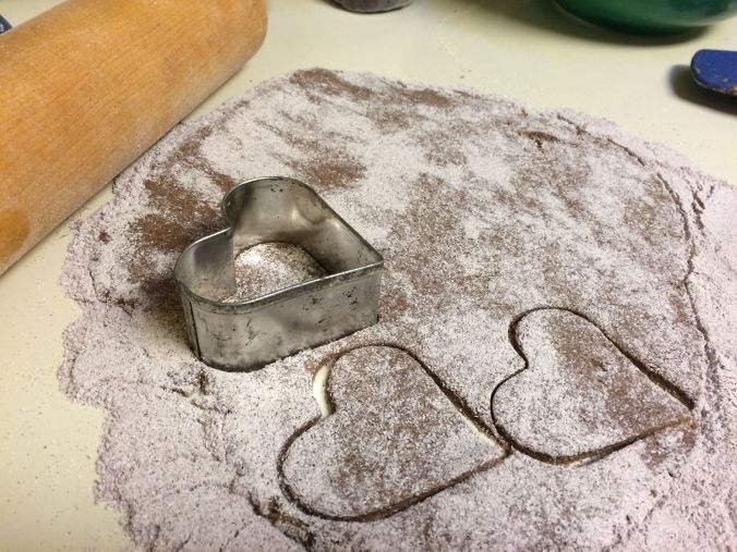 Rolling out cookie dough for Purple Prairie Barley cookies
