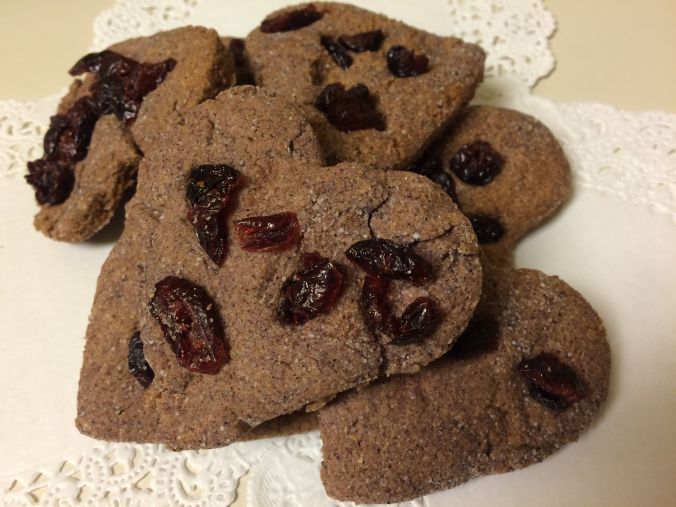Purple barley Valentine cookies with cranberry decoration