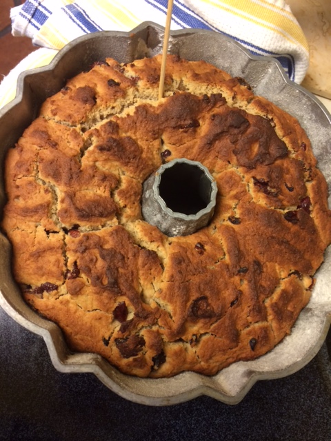 You can test to see if dough is done thru using a wooden kabob skewer or cake tester. Listen to hear if bubbles are still popping in the dough.