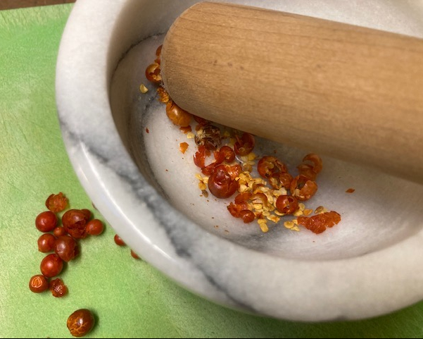 Harvest picante chiltepines from your own garden--or find them at NSS or the Mexican food section at the grocery.